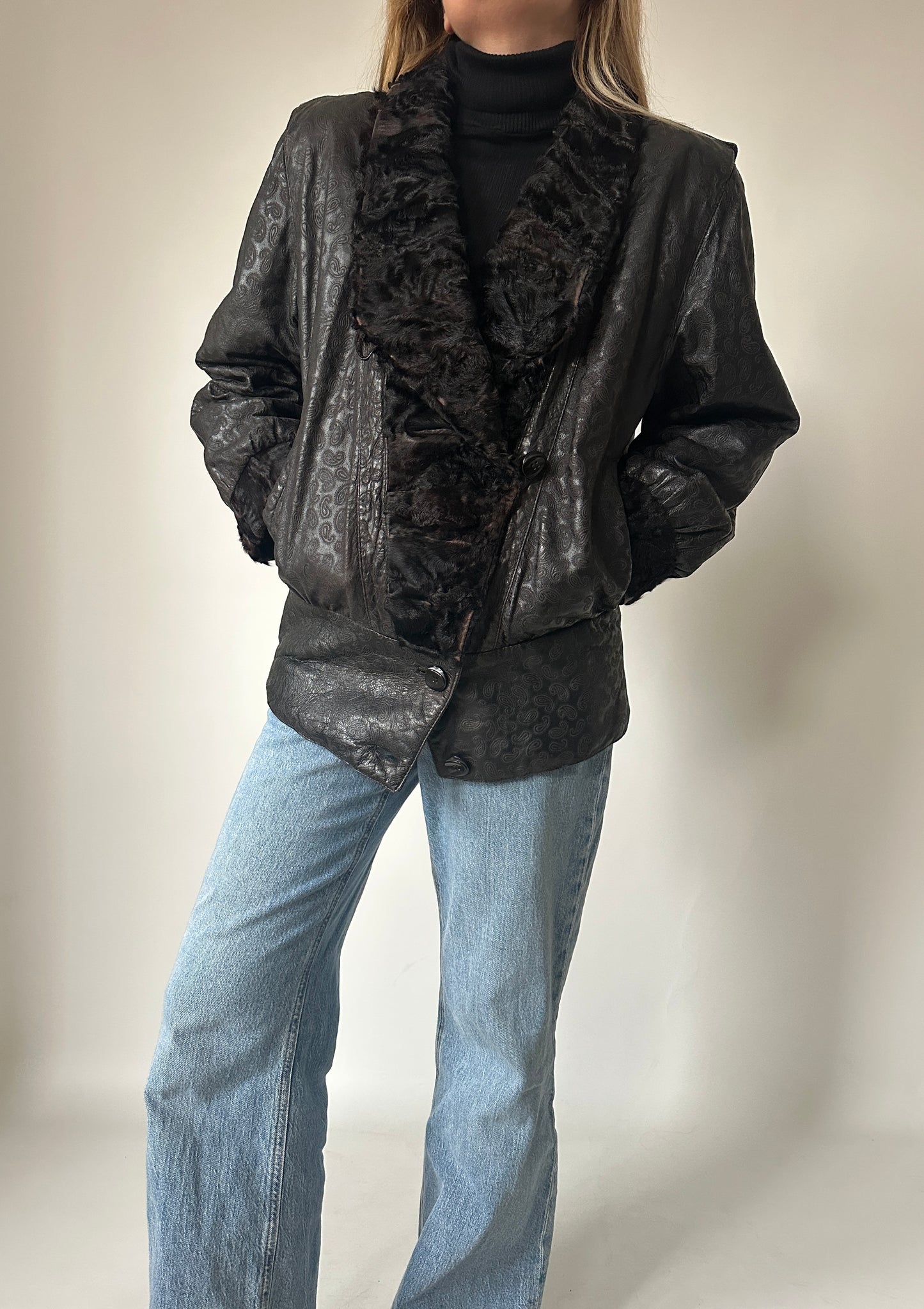 Giacca in pelle e astrakan