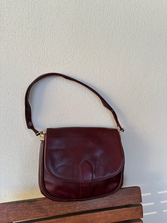 Burgundy leather postina