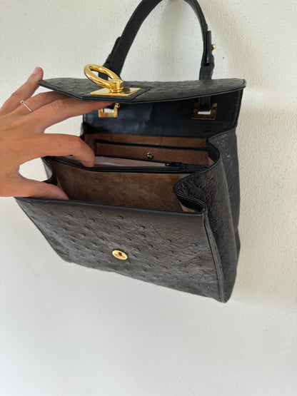 Black crocodile print handbag