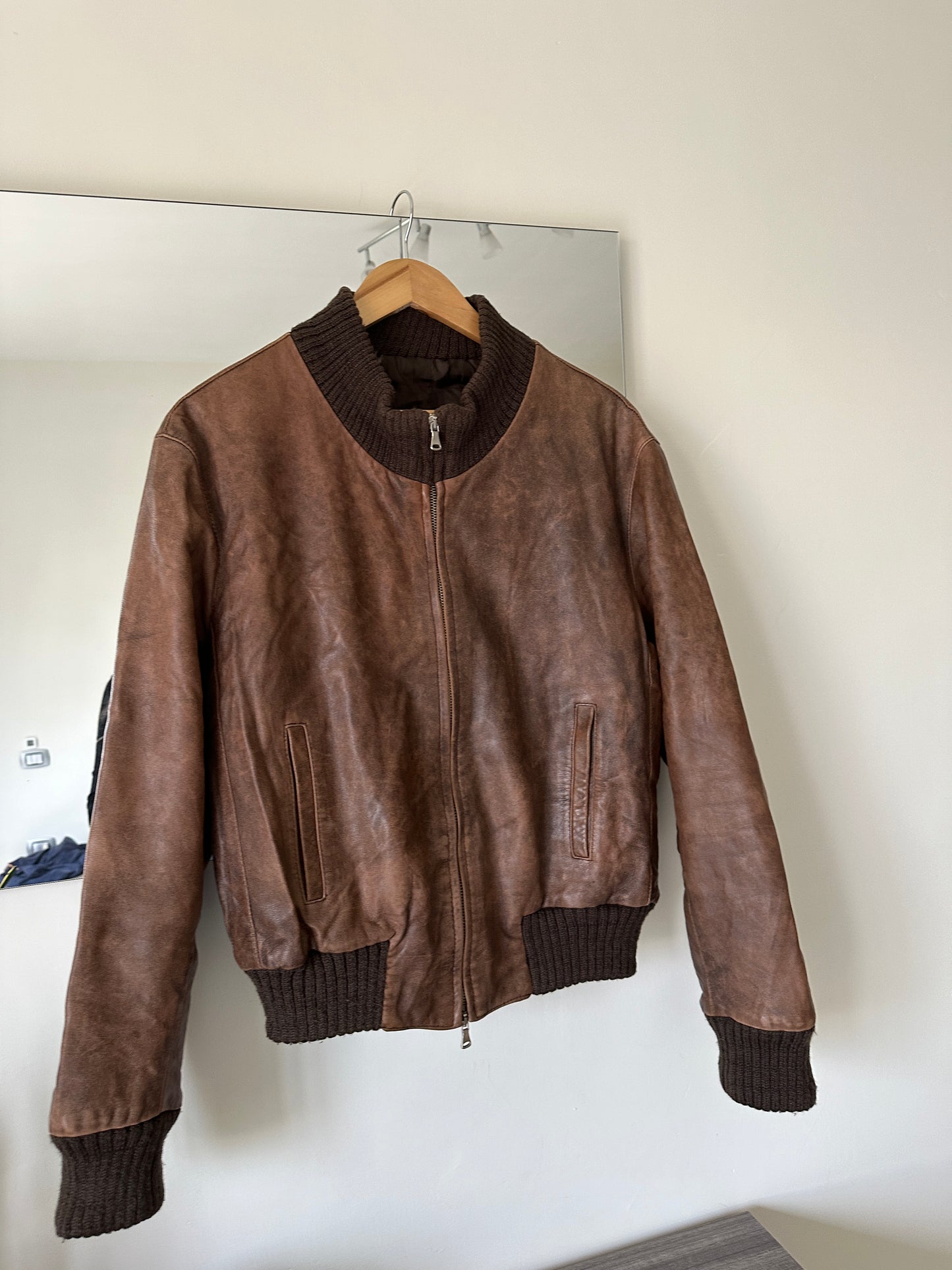 Distressed leather bomber