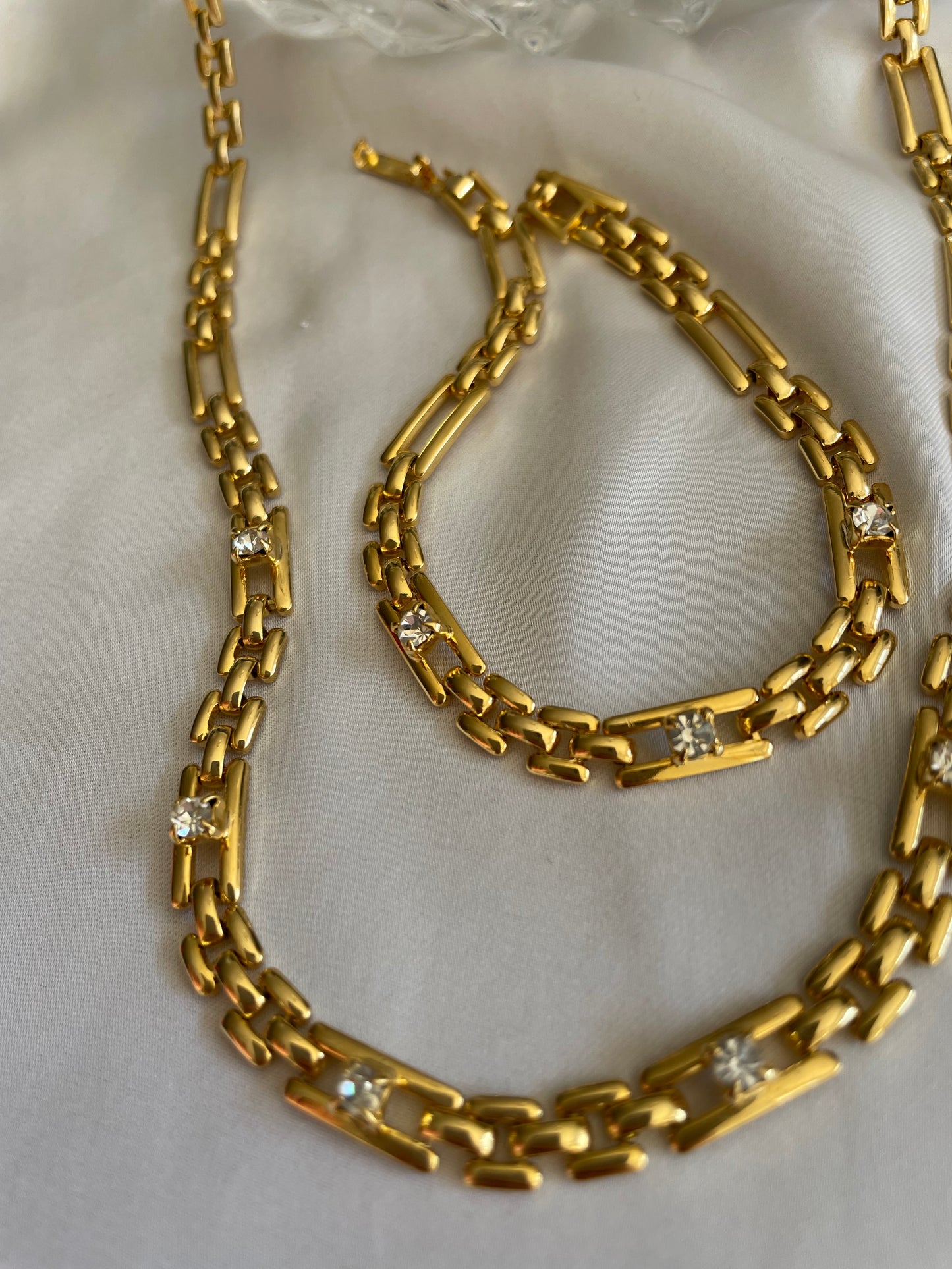 Set collana e bracciale goldtone con zirconi