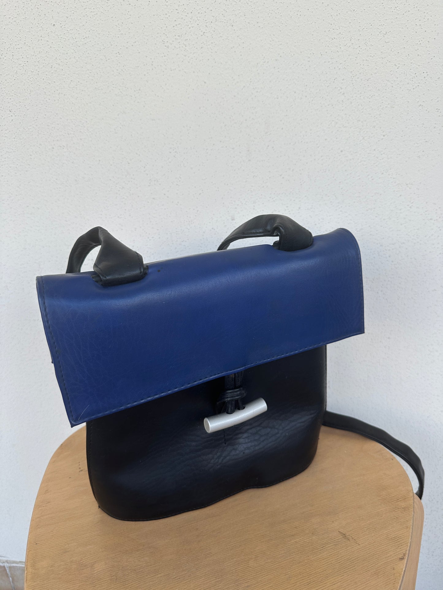 Black and blue leather bag