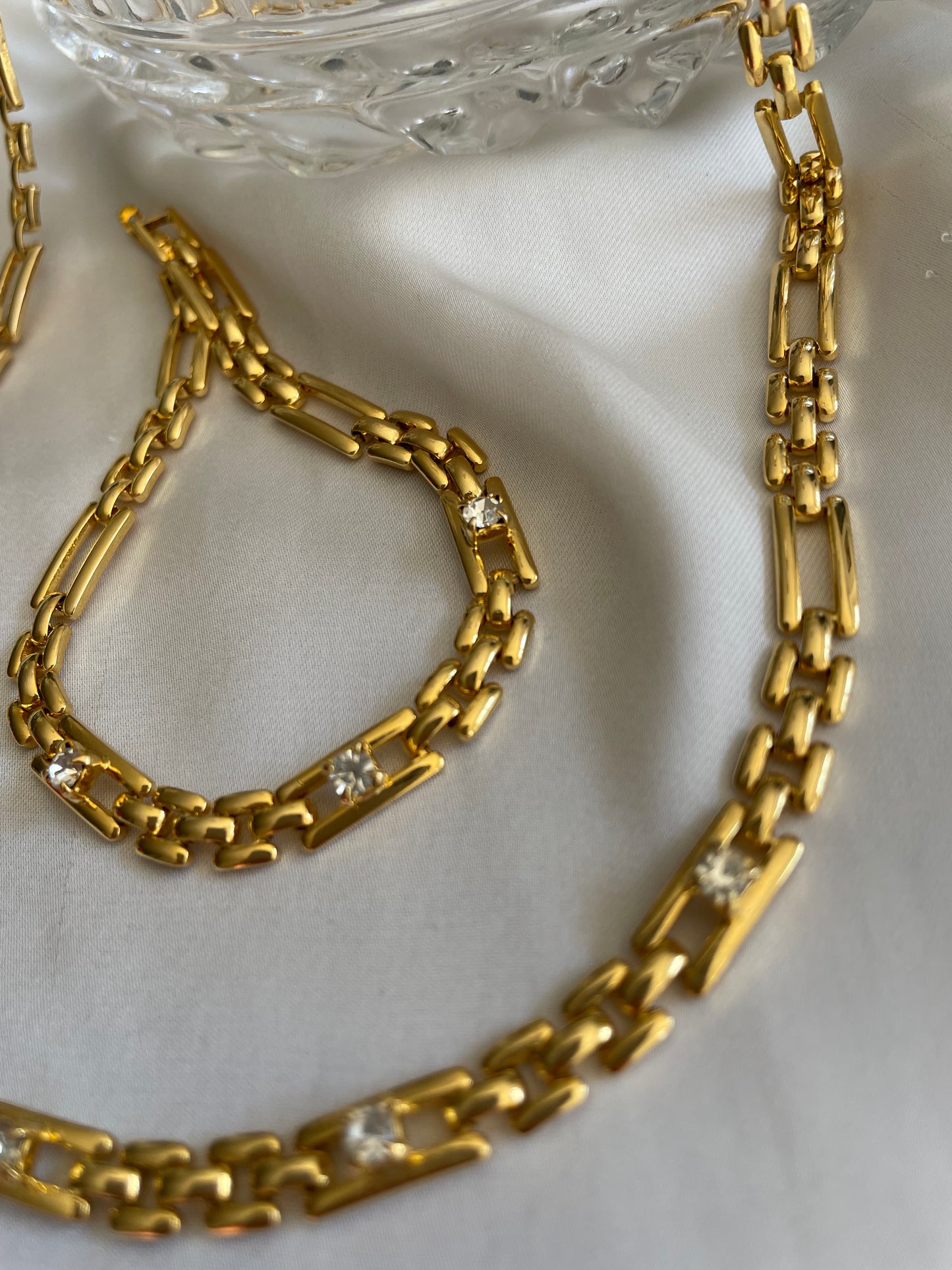 Set collana e bracciale goldtone con zirconi