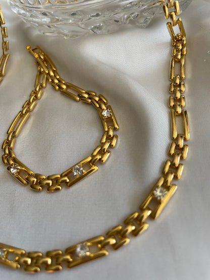 Set collana e bracciale goldtone con zirconi