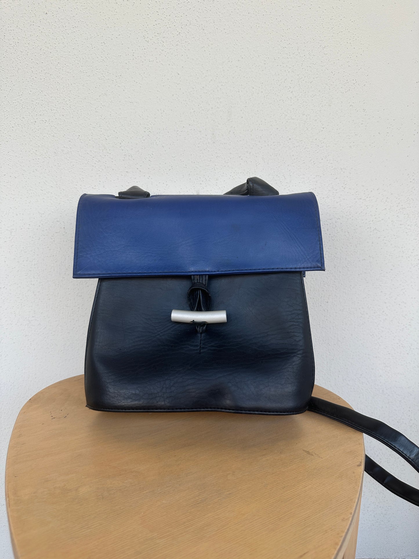 Black and blue leather bag