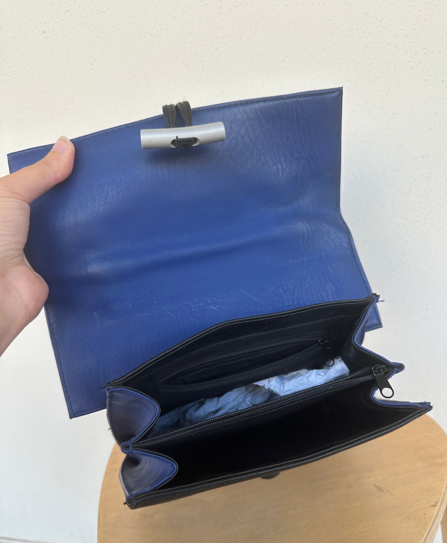 Black and blue leather bag