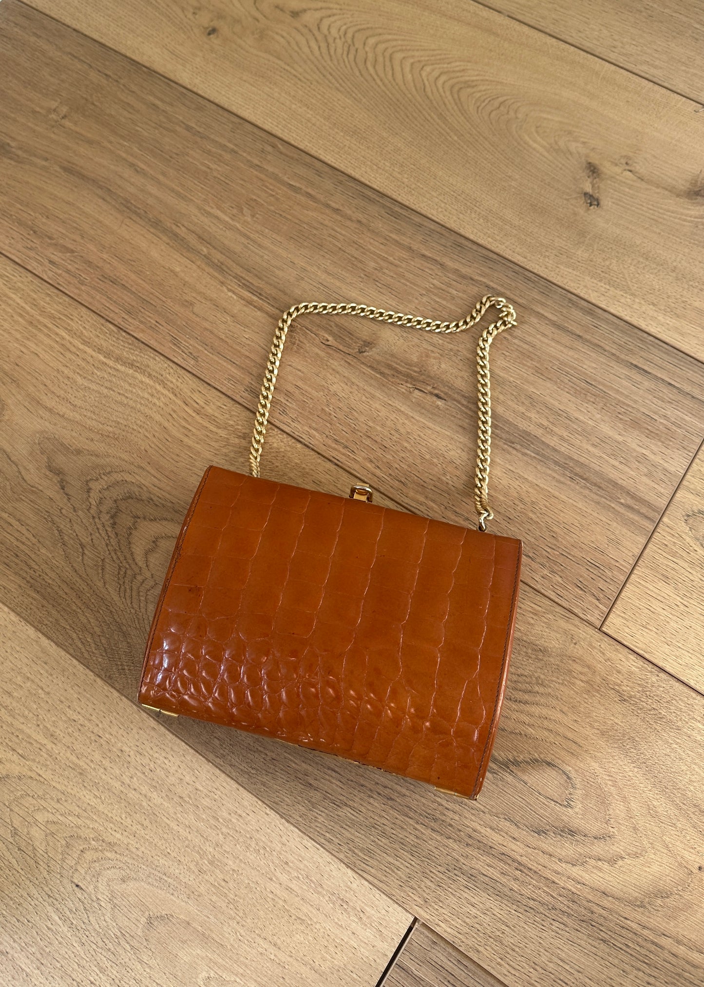 Caramel croco leather clutch