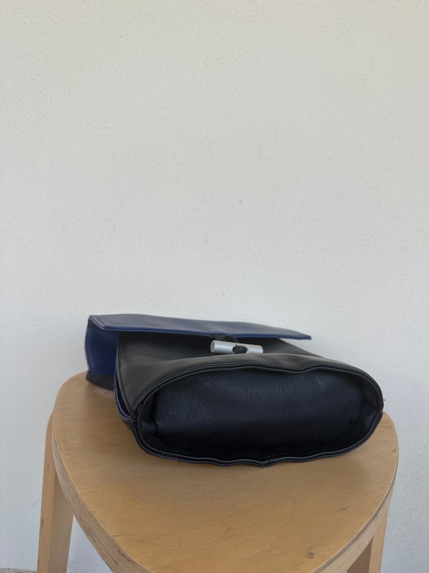 Black and blue leather bag