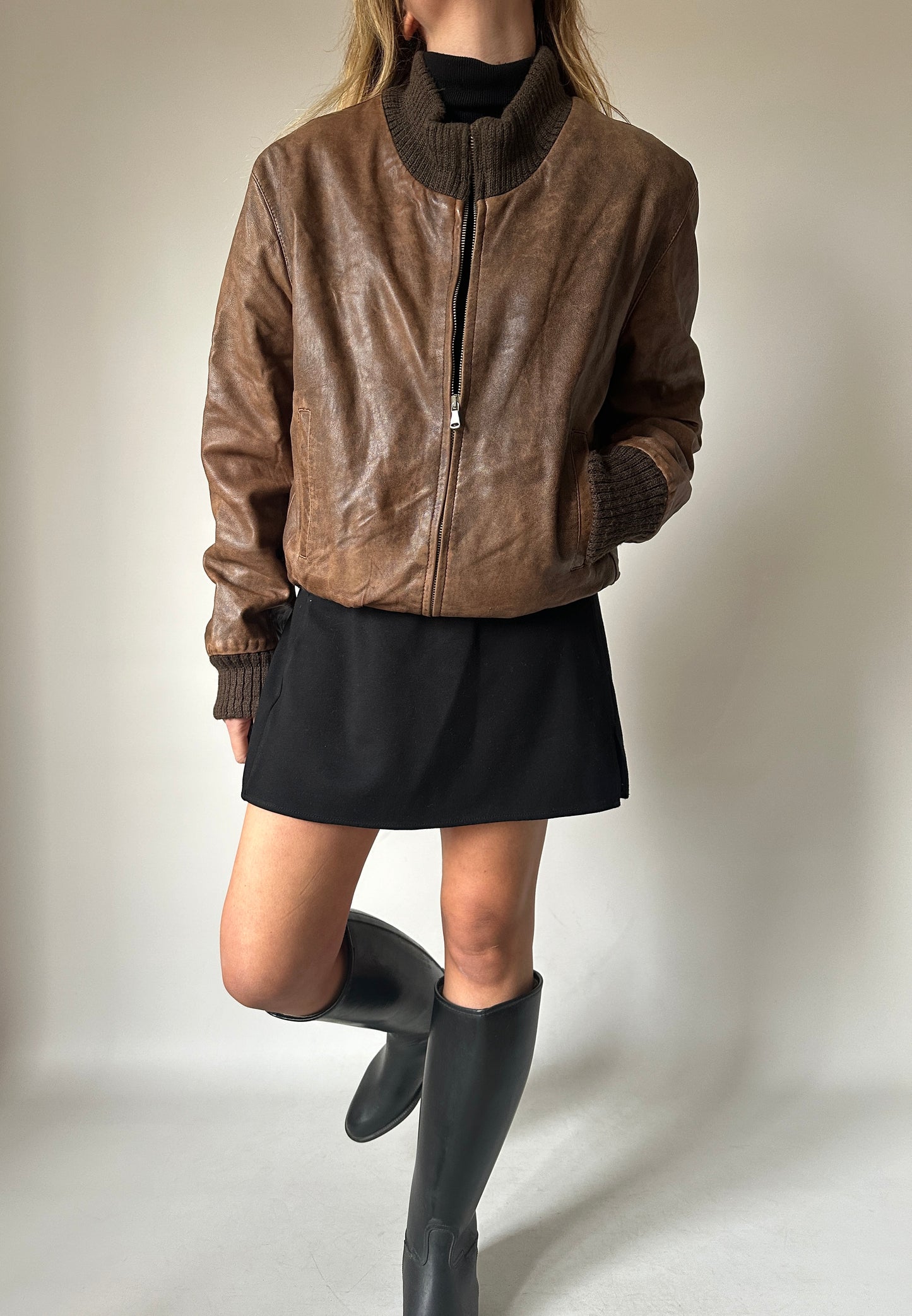 Distressed leather bomber