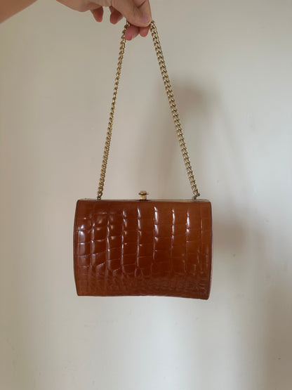 Caramel croco leather clutch