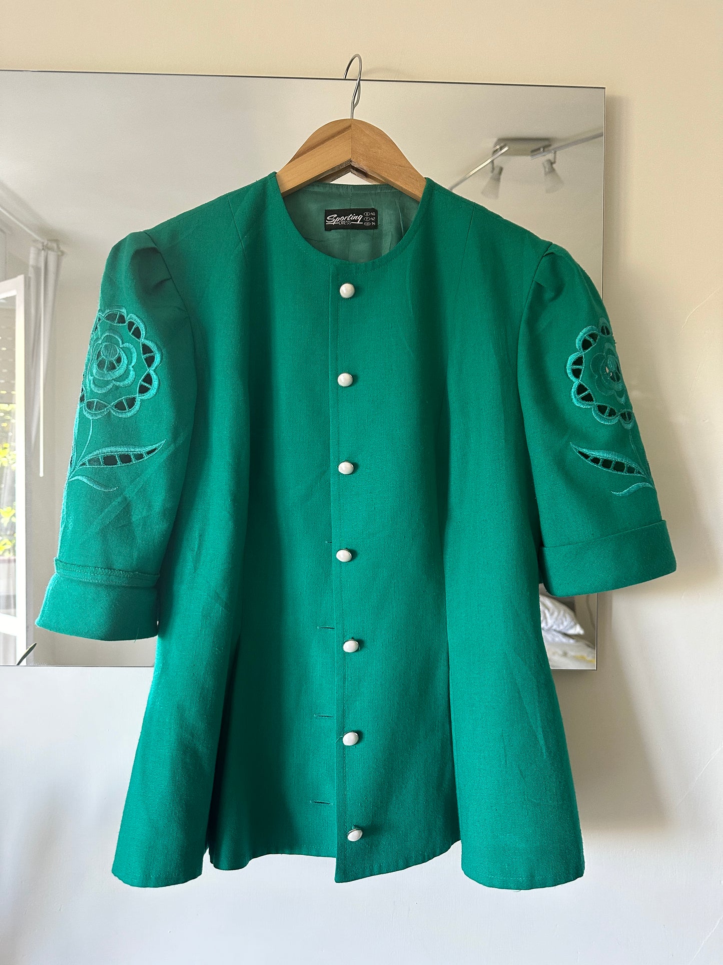 Tailored emerald linen jacket