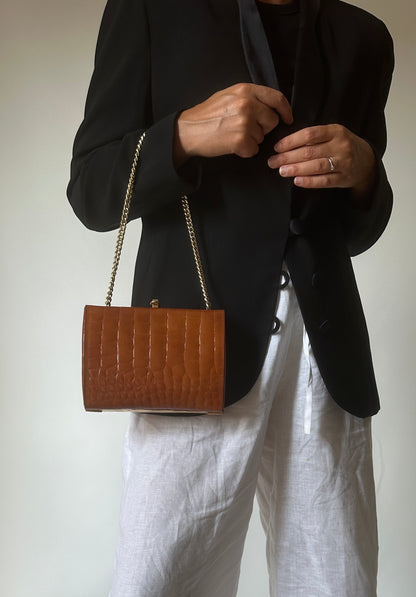 Caramel croco leather clutch