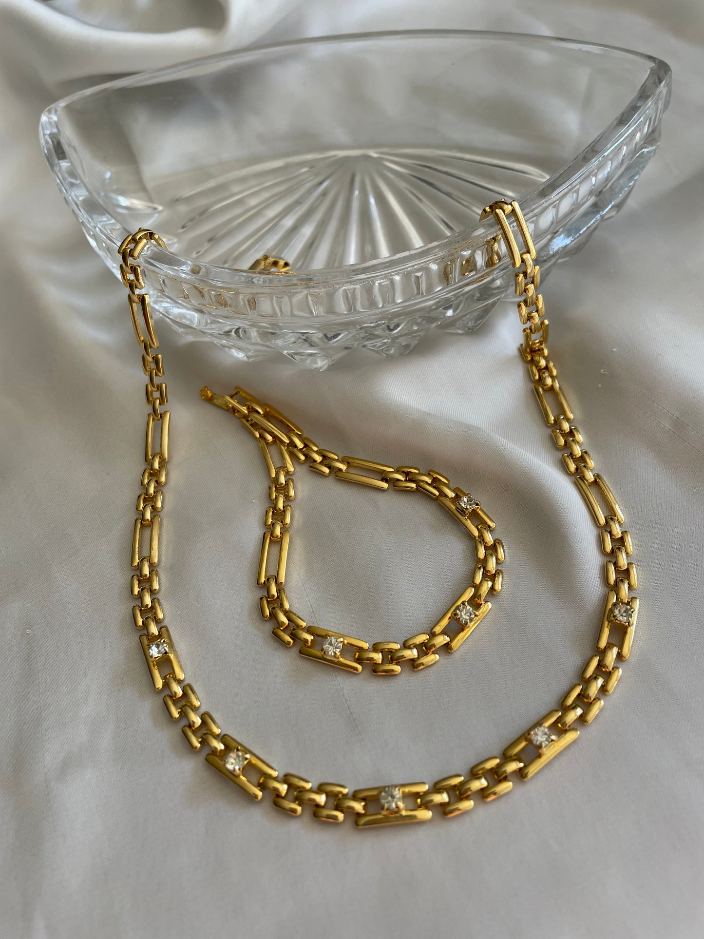 Set collana e bracciale goldtone con zirconi