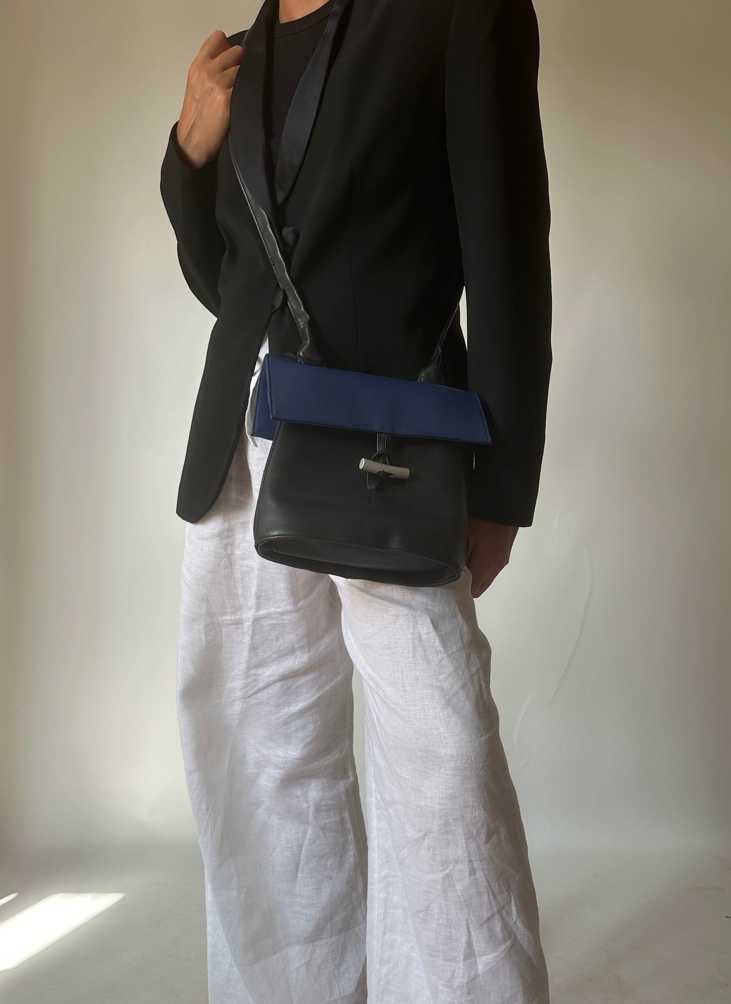 Black and blue leather bag